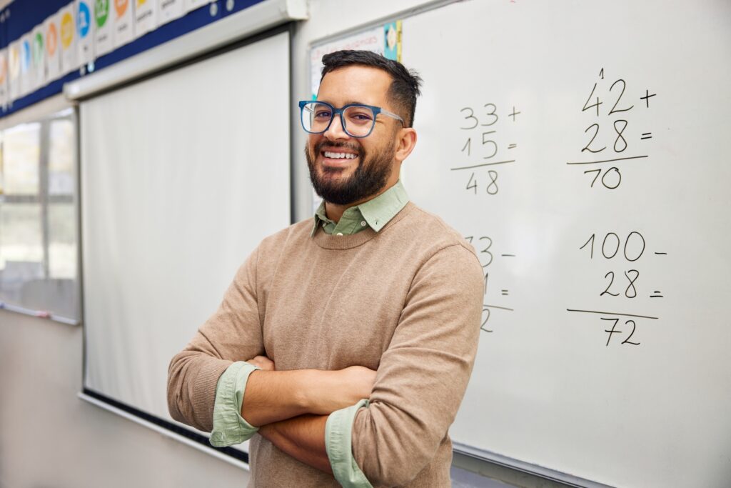 maths teacher, teaching a call of students in a secondary school