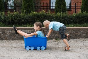 Children playing outside - enjoying the summer holidays
